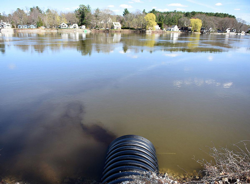 sewage pipe leaking into merrimack river.