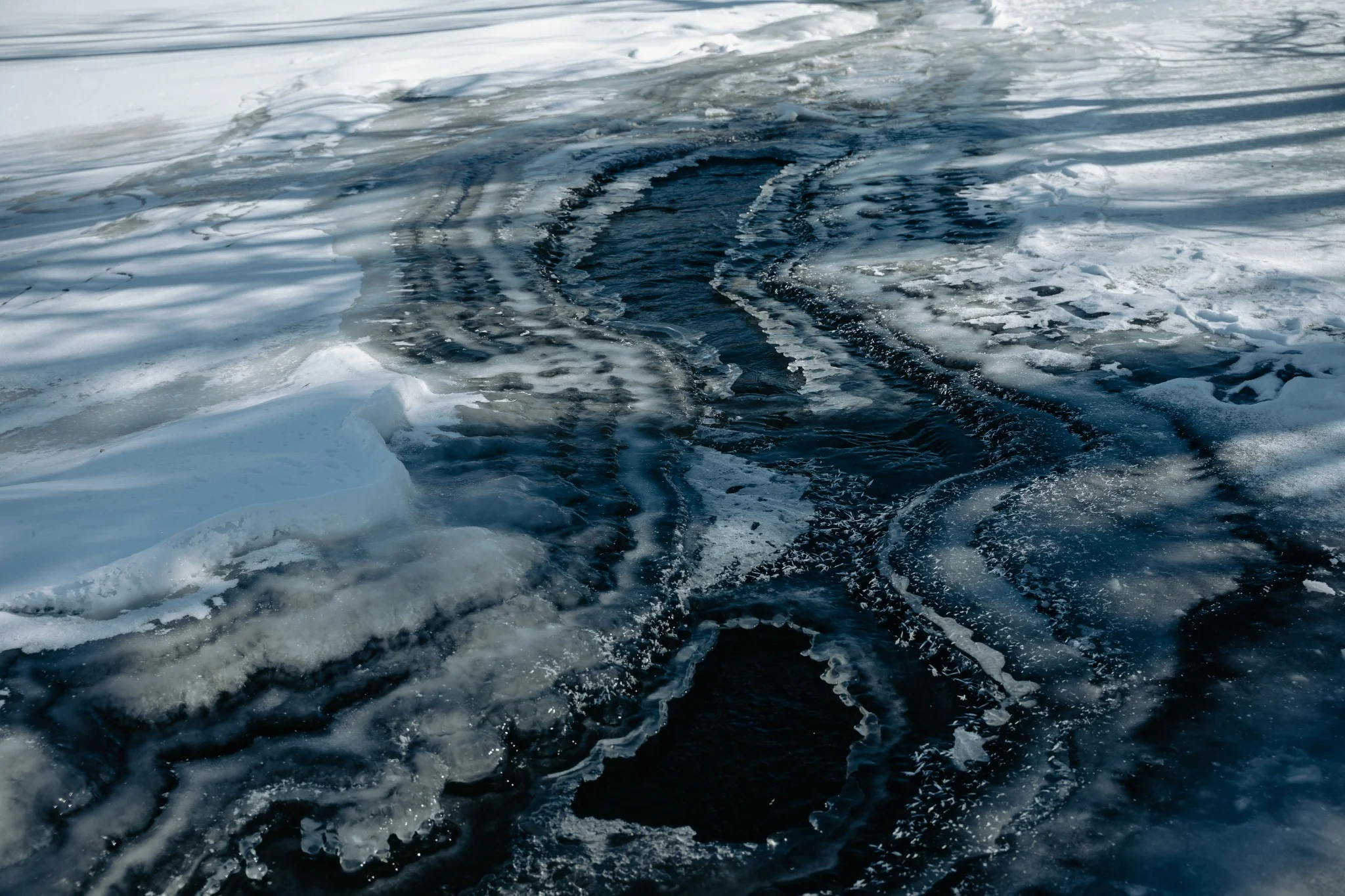 Snowmelt and ice runoff that can cause contaminant levels to spike in water